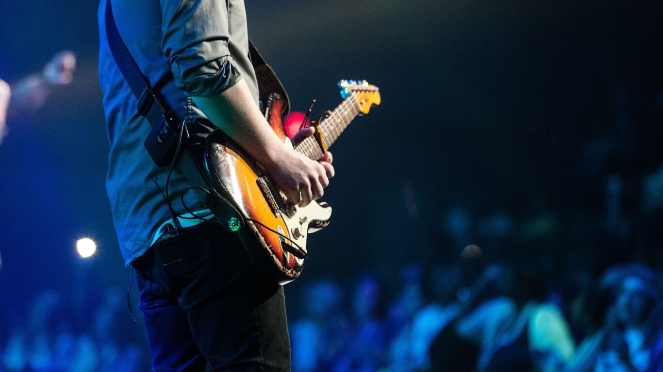 stock image man with guitar